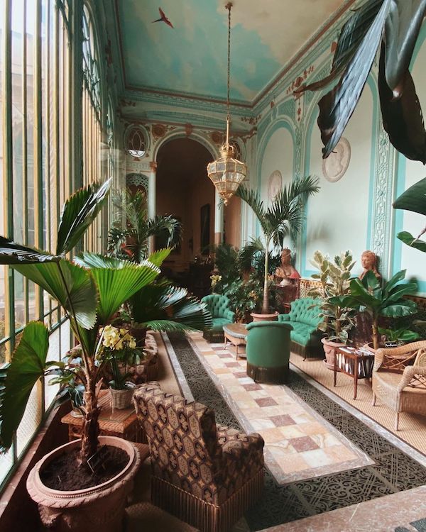 inside a long room with exotic decor