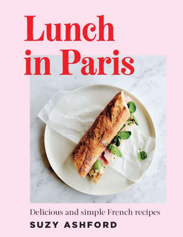 cookbook cover featuring baguette sandwich on plate