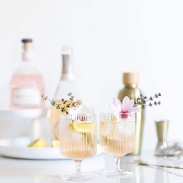 Mirabeau_Cocktail_provence_spritz (4) two cocktail glasses filled with a fresh summer cocktail