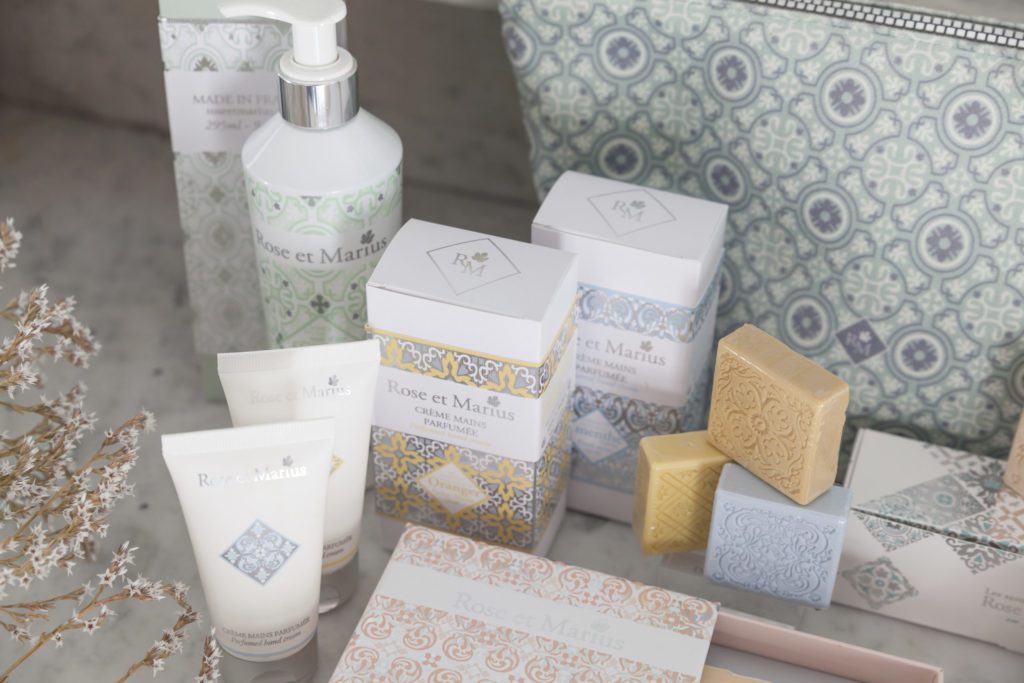 pastel colored soaps and hand lotions display