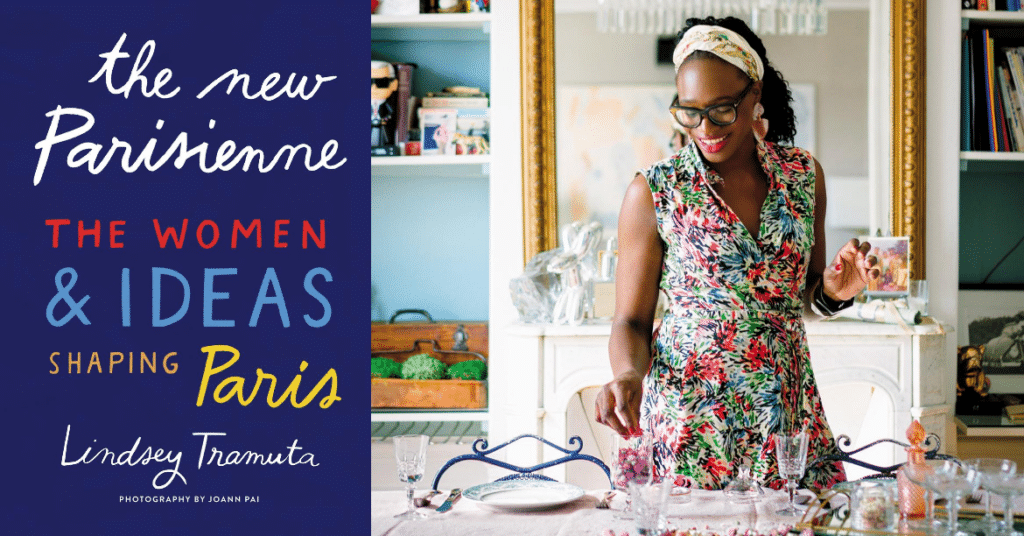 a woman in a patterned dress and the cover of a book