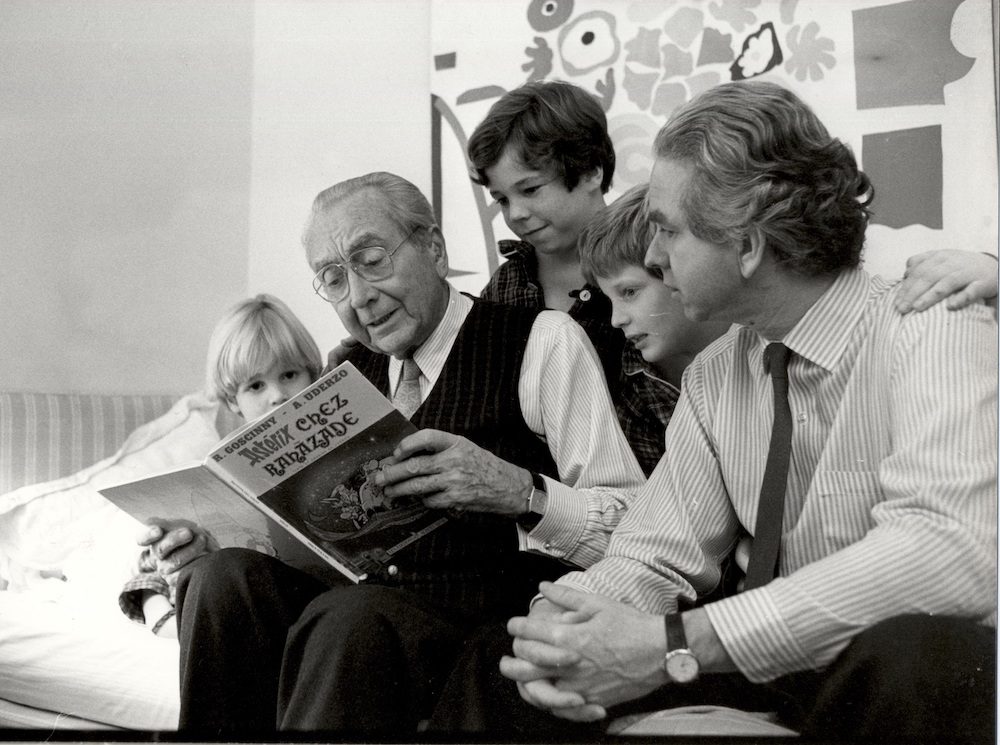 a family reading a cartoon