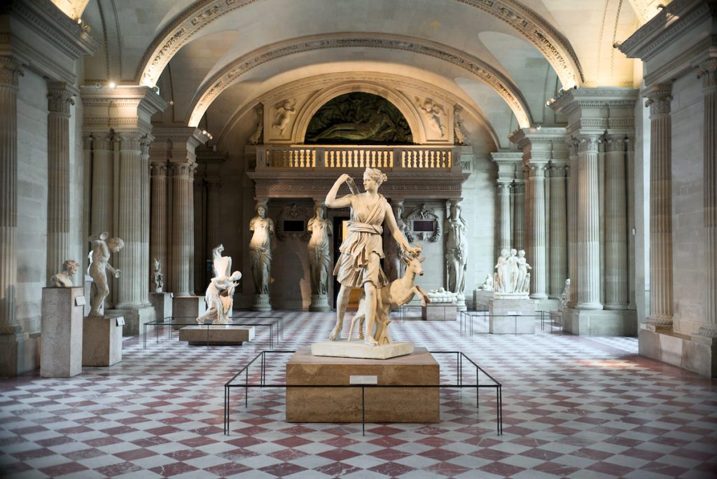 louvre gallery with statues