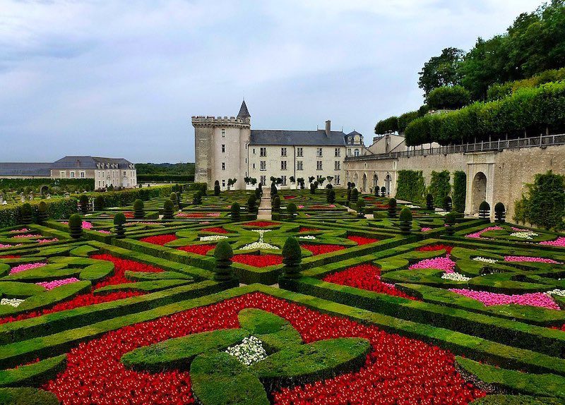 topiary red flowers and chateau