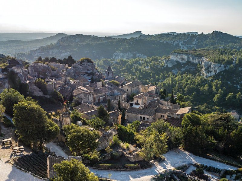 a view of a hilltop village in france