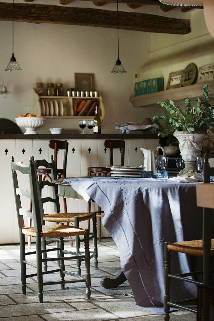https://myfrenchcountryhomemagazine.com/wp-content/uploads/2021/08/11061431-Rustic-kitchen-dining-room-with-wooden-table_MAIN-682x1024.jpg