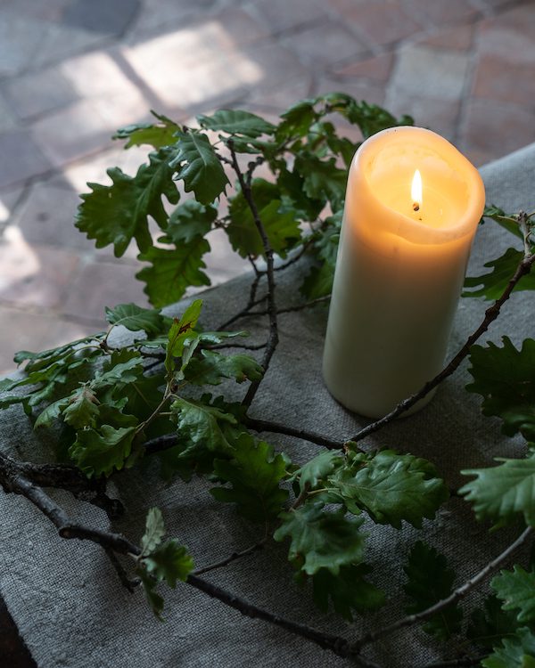 candle and foliage