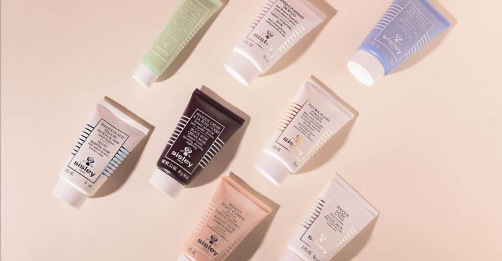 French Face Masks by Sisley on Pink Background