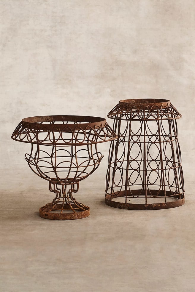 aged wrought iron urn