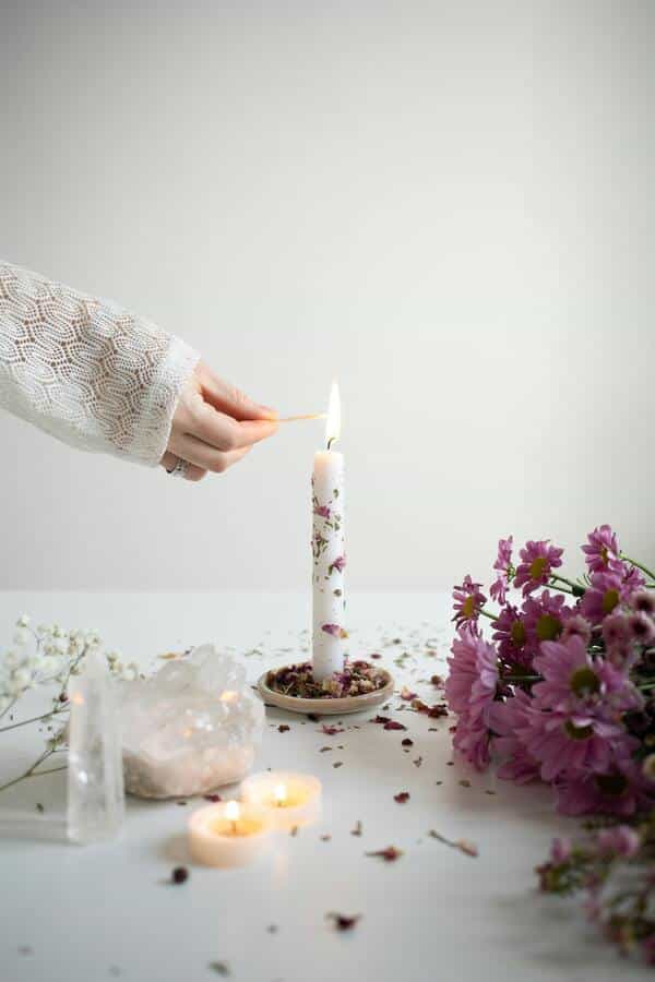 candle with dried flowers