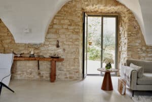 Historic French farm house interior with bright natural light. 