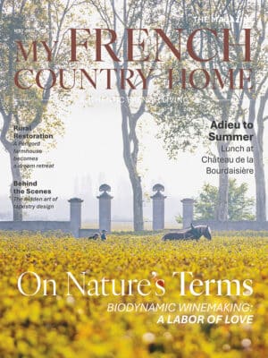 My French Country Home September/October 2026 Magazine cover featuring farmers and a horse in a vineyard.