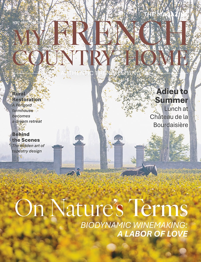 My French Country Home September/October 2026 Magazine cover featuring farmers and a horse in a vineyard.