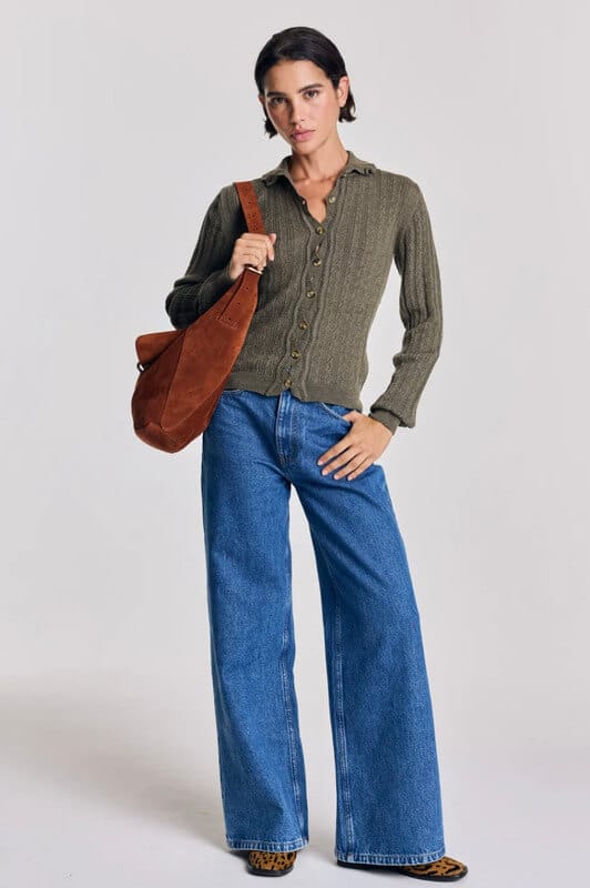 Olive green Balzac textured knit styled with barrel jeans and a suede leather satchel.